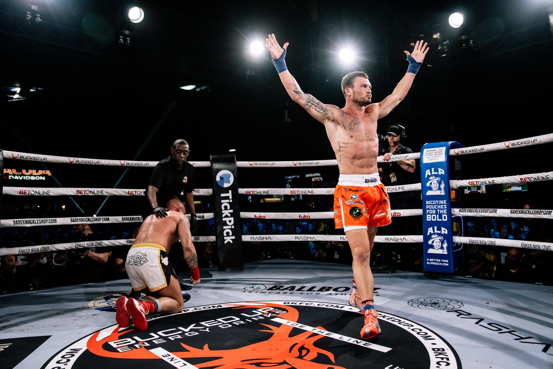 Mike Heckert celebrates a BKFC win